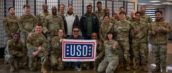 Durousseau, Robinson and Shin among a crowd of troops.